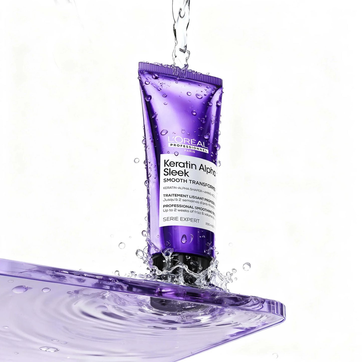 Keratin Alpha Sleek Smooth Transformer for long-lasting smoothness, frizz & volume control.